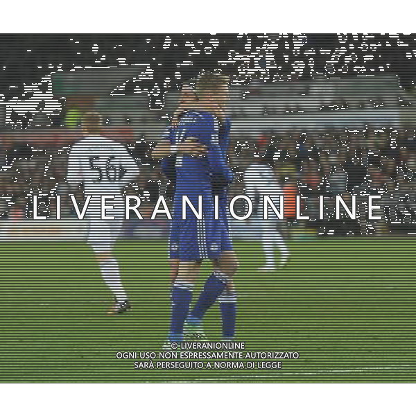 CELE - Chelsea\'s Andre Schurrle celebrates scoring his sides fifth goal with team mate Filipe Luis Photographer /Ashley CrowdenCameraSport Football - Barclays Premiership - Swansea City v Chelsea - Saturday 17th January 2015 - Liberty Stadium - Swansea © CameraSport - 43 Linden Ave. Countesthorpe. Leicester. England. LE8 5PG - Tel: +44 (0) 116 277 4147 - admin@camerasport.com - www.camerasport.com AG ALDO LIVERANI SAS ONLY ITALY