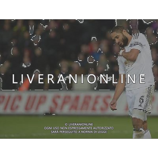 Swansea City\'s Ashley Williams holds his shoulder in pain during the game Photographer /Ashley CrowdenCameraSport Football - Barclays Premiership - Swansea City v Chelsea - Saturday 17th January 2015 - Liberty Stadium - Swansea © CameraSport - 43 Linden Ave. Countesthorpe. Leicester. England. LE8 5PG - Tel: +44 (0) 116 277 4147 - admin@camerasport.com - www.camerasport.com AG ALDO LIVERANI SAS ONLY ITALY