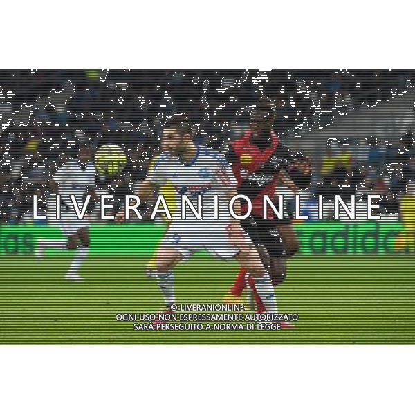Andre Pierre GIGNAC / Benjamin ANGOUA - 18.01.2015 - Marseille / Guingamp - 21eme journee de Ligue 1 - Photo : Gaston Petrelli / Icon Sport /Agenzia Aldo Liverani sas -