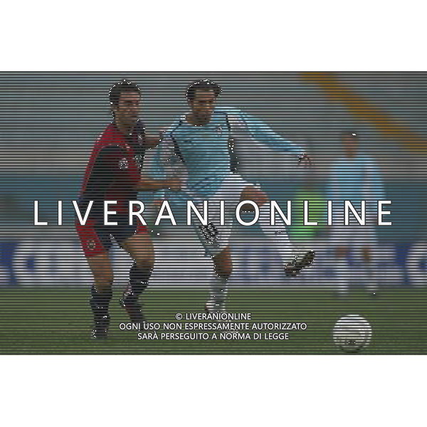 Roma 13/01/2005 Lazio-Cagliari Tim Cup 2004/2005 Nella foto: Albino Marcello contro Aparecido Rodrigue Cesar.* Ph Gianni Nucci/Aldo Liverani