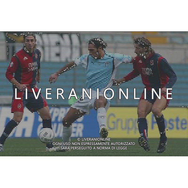 Roma 13/01/2005 Lazio-Cagliari Tim Cup 2004/2005 Nella foto: Bazzani Fabio contro Maltagliati Roberto e Conti Daniele.* Ph Gianni Nucci/Aldo Liverani