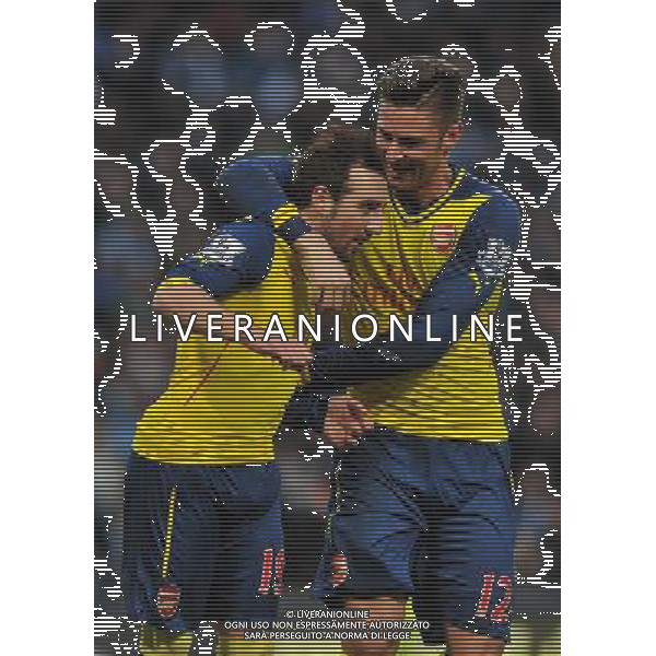 Goal scorer Arsenal\'s Santi Cazorla is congratulated by team mate Olivier Giroud Photographer Dave Howarth/CameraSport Football - Barclays Premiership - Manchester City v Arsenal - Sunday 18th January 2015 - Etihad stadium - Manchester © CameraSport - 43 Linden Ave. Countesthorpe. Leicester. England. LE8 5PG - Tel: +44 (0) 116 277 4147 - admin@camerasport.com - www.camerasport.com AG ALDO LIVERANI SAS ONLY ITALY