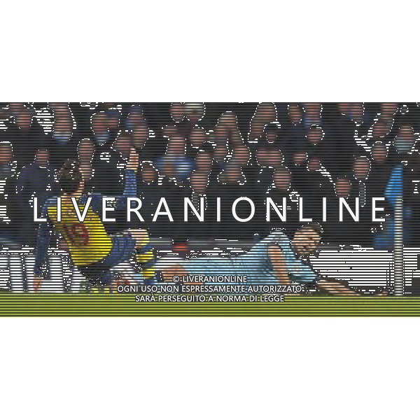 Manchester City\'s Sergio AgŸero is tackled by Arsenal\'s Santi Cazorla Photographer Dave Howarth/CameraSport Football - Barclays Premiership - Manchester City v Arsenal - Sunday 18th January 2015 - Etihad stadium - Manchester © CameraSport - 43 Linden Ave. Countesthorpe. Leicester. England. LE8 5PG - Tel: +44 (0) 116 277 4147 - admin@camerasport.com - www.camerasport.com AG ALDO LIVERANI SAS ONLY ITALY