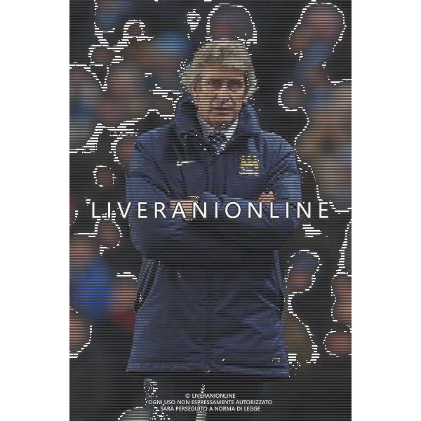 Manchester City\'s Manager Manuel Pellegrini looks dejected at the result Photographer Dave Howarth/CameraSport Football - Barclays Premiership - Manchester City v Arsenal - Sunday 18th January 2015 - Etihad stadium - Manchester © CameraSport - 43 Linden Ave. Countesthorpe. Leicester. England. LE8 5PG - Tel: +44 (0) 116 277 4147 - admin@camerasport.com - www.camerasport.com AG ALDO LIVERANI SAS ONLY ITALY
