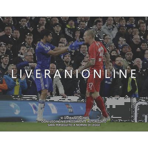 Liverpool\'s Martin Skrtel battles with Chelsea\'s Diego Costa Photographer Ashley Western /CameraSport Football - Capital One Cup Semi Final Second Leg - Chelsea v Liverpool - Tuesday 27th January 2015 - Stamford Bridge - London © CameraSport - 43 Linden Ave. Countesthorpe. Leicester. England. LE8 5PG - Tel: +44 (0) 116 277 4147 - admin@camerasport.com - www.camerasport.com AG ALDO LIVERANI SAS ONLY ITALY