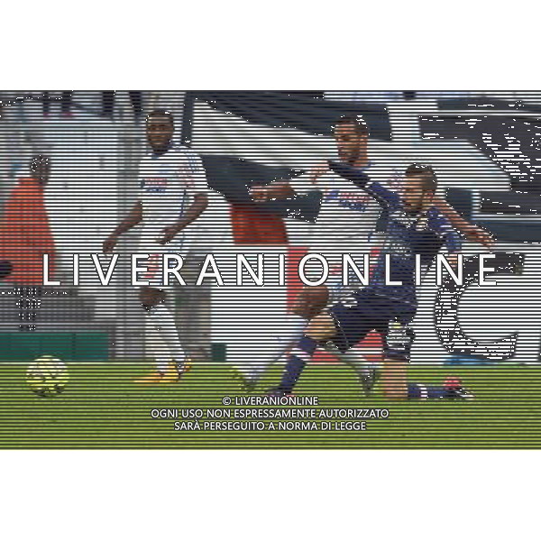Alaixys ROMAO / Nicolas BENEZET - 31.01.2015 - Marseille / Evian Thonon - 23eme journee de Ligue 1 - Photo : Gaston Petrelli / Icon Sport /Agenzia Aldo Liverani sas - ITALY ONLY - EDITORIAL USE ONLY