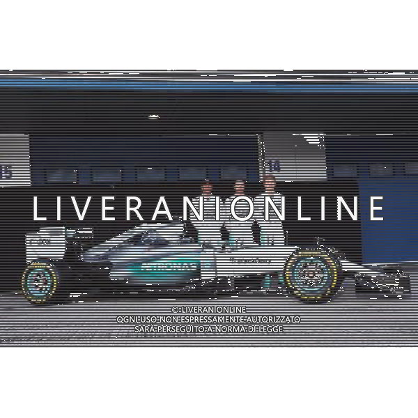 (L to R): Lewis Hamilton (GBR) Mercedes AMG F1; Pascal Wehrlein (GER) Mercedes AMG F1 Reserve Driver; and Nico Rosberg (GER) Mercedes AMG F1 with the Mercedes AMG F1 W06. 01.02.2015. Formula One Testing, Day One, Jerez, Spain. AG ALDO LIVERANI SAS ONLY ITALY