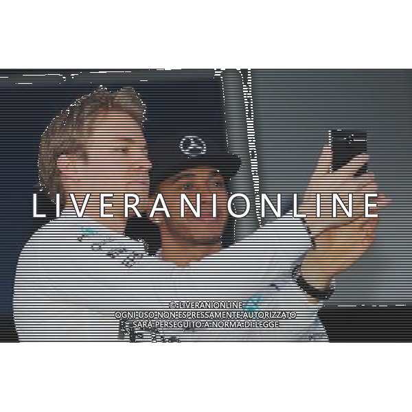 (L to R): Nico Rosberg (GER) Mercedes AMG F1 with team mate Lewis Hamilton (GBR) Mercedes AMG F1. 01.02.2015. Formula One Testing, Day One, Jerez, Spain. AG ALDO LIVERANI SAS ONLY ITALY