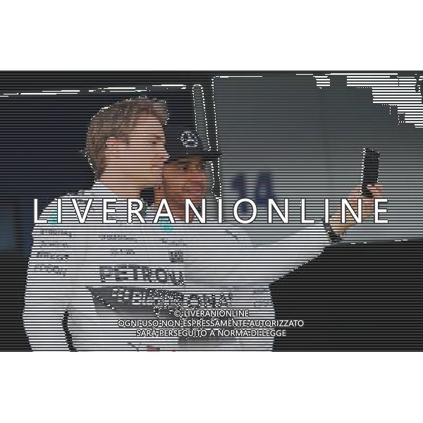 (L to R): Nico Rosberg (GER) Mercedes AMG F1 with team mate Lewis Hamilton (GBR) Mercedes AMG F1. 01.02.2015. Formula One Testing, Day One, Jerez, Spain. AG ALDO LIVERANI SAS ONLY ITALY