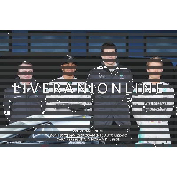 (L to R): Paddy Lowe (GBR) Mercedes AMG F1 Executive Director (Technical) with Lewis Hamilton (GBR) Mercedes AMG F1; Toto Wolff (GER) Mercedes AMG F1 Shareholder and Executive Director; and Nico Rosberg (GER) Mercedes AMG F1. 01.02.2015. Formula One Testing, Day One, Jerez, Spain. AG ALDO LIVERANI SAS ONLY ITALY