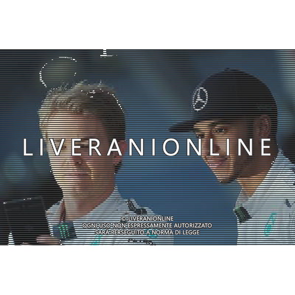 (L to R): Nico Rosberg (GER) Mercedes AMG F1 with Lewis Hamilton (GBR) Mercedes AMG F1. 01.02.2015. Formula One Testing, Day One, Jerez, Spain. AG ALDO LIVERANI SAS ONLY ITALY