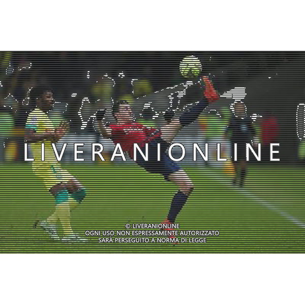 Sebastien CORCHIA / Georges Kevin NKOUDOU - 31.01.2015 - Nantes / Lille - 23eme journee de Ligue 1 - Photo : Vincent Michel / Icon Sport AG ALDO LIVERANI SAS ONLY ITALY