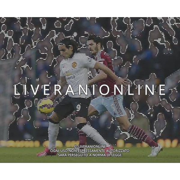 Manchester United\'s Radamel Falcao Garcia shields the ball from West Ham United\'s James Tomkins Photographer Craig Mercer/CameraSport Football - Barclays Premiership - West Ham United v Manchester United - Sunday 8th February 2015 - Boleyn Ground - London © CameraSport - 43 Linden Ave. Countesthorpe. Leicester. England. LE8 5PG - Tel: +44 (0) 116 277 4147 - admin@camerasport.com - www.camerasport.com /Agenzia Aldo Liverani Sas - ITALY ONLY - EDITORIAL USE ONLY