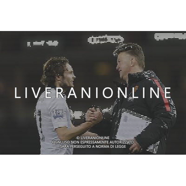 Manchester United manager Louis van Gaal shakes hands with his goalscorer Daley Blind at the final whistle Photographer Craig Mercer/CameraSport Football - Barclays Premiership - West Ham United v Manchester United - Sunday 8th February 2015 - Boleyn Ground - London © CameraSport - 43 Linden Ave. Countesthorpe. Leicester. England. LE8 5PG - Tel: +44 (0) 116 277 4147 - admin@camerasport.com - www.camerasport.com /Agenzia Aldo Liverani Sas - ITALY ONLY - EDITORIAL USE ONLY