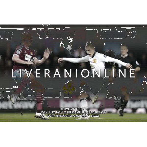 Manchester United\'s Adnan Januzaj gets a shot in despite the attentions of West Ham United\'s Kevin Nolan Photographer Craig Mercer/CameraSport Football - Barclays Premiership - West Ham United v Manchester United - Sunday 8th February 2015 - Boleyn Ground - London © CameraSport - 43 Linden Ave. Countesthorpe. Leicester. England. LE8 5PG - Tel: +44 (0) 116 277 4147 - admin@camerasport.com - www.camerasport.com /Agenzia Aldo Liverani Sas - ITALY ONLY - EDITORIAL USE ONLY