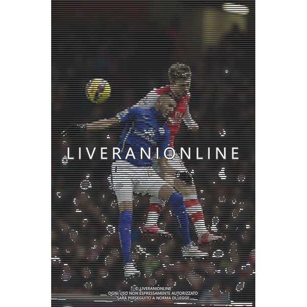 Arsenal\'s Per Mertesacker battles with Leicester City\'s Riyad Mahrez Photographer Craig Mercer/CameraSport Football - Barclays Premiership - Arsenal v Leicester City - Tuesday 10th February 2015 - Emirates Stadium - London © CameraSport - 43 Linden Ave. Countesthorpe. Leicester. England. LE8 5PG - Tel: +44 (0) 116 277 4147 - admin@camerasport.com - www.camerasport.com AG ALDO LIVERANI SAS ONLY ITALY