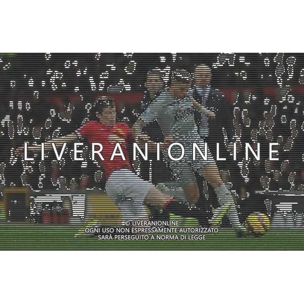 Burnley\'s Michael Kightly is tackled by Manchester United\'s Paddy McNair Photographer Dave Howarth/CameraSport Football - Barclays Premiership - Manchester United v Burnley - Wednesday 11th February 2015 - Old Trafford - Manchester © CameraSport - 43 Linden Ave. Countesthorpe. Leicester. England. LE8 5PG - Tel: +44 (0) 116 277 4147 - admin@camerasport.com - www.camerasport.com AG ALDO LIVERANI SAS ONLY ITALY