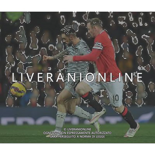 Burnley\'s Danny Ings battles with Manchester United\'s Wayne Rooney Photographer Dave Howarth/CameraSport Football - Barclays Premiership - Manchester United v Burnley - Wednesday 11th February 2015 - Old Trafford - Manchester © CameraSport - 43 Linden Ave. Countesthorpe. Leicester. England. LE8 5PG - Tel: +44 (0) 116 277 4147 - admin@camerasport.com - www.camerasport.com AG ALDO LIVERANI SAS ONLY ITALY
