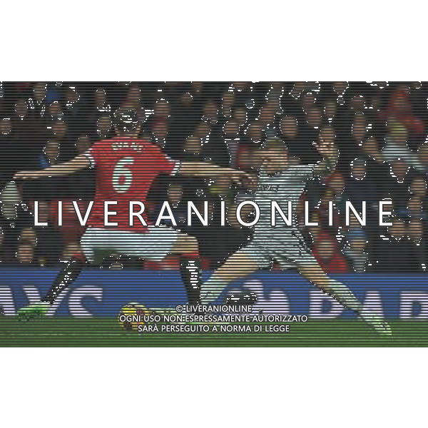 Burnley\'s Kieran Trippier battles with Manchester United\'s Jonny Evans Photographer Dave Howarth/CameraSport Football - Barclays Premiership - Manchester United v Burnley - Wednesday 11th February 2015 - Old Trafford - Manchester © CameraSport - 43 Linden Ave. Countesthorpe. Leicester. England. LE8 5PG - Tel: +44 (0) 116 277 4147 - admin@camerasport.com - www.camerasport.com AG ALDO LIVERANI SAS ONLY ITALY