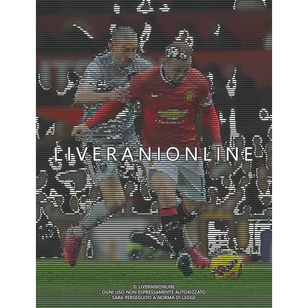 Burnley\'s David Jones battles with Manchester United\'s Wayne Rooney Photographer Dave Howarth/CameraSport Football - Barclays Premiership - Manchester United v Burnley - Wednesday 11th February 2015 - Old Trafford - Manchester © CameraSport - 43 Linden Ave. Countesthorpe. Leicester. England. LE8 5PG - Tel: +44 (0) 116 277 4147 - admin@camerasport.com - www.camerasport.com AG ALDO LIVERANI SAS ONLY ITALY