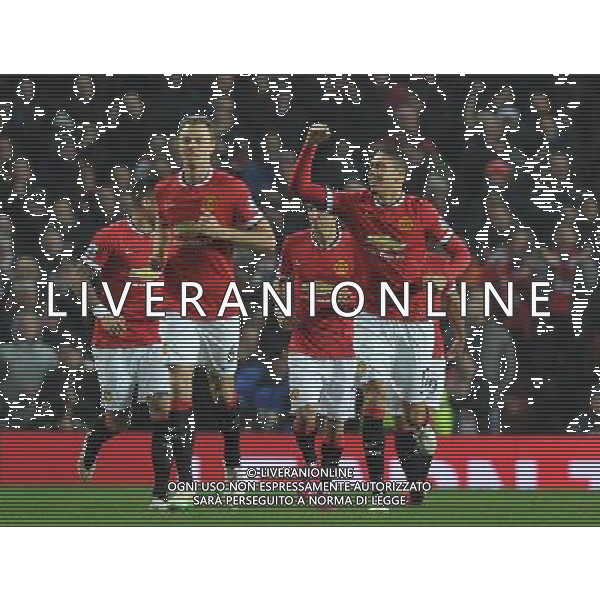 Manchester United\'s Chris Smalling celebrates his opening goal Photographer Dave Howarth/CameraSport Football - Barclays Premiership - Manchester United v Burnley - Wednesday 11th February 2015 - Old Trafford - Manchester © CameraSport - 43 Linden Ave. Countesthorpe. Leicester. England. LE8 5PG - Tel: +44 (0) 116 277 4147 - admin@camerasport.com - www.camerasport.com AG ALDO LIVERANI SAS ONLY ITALY