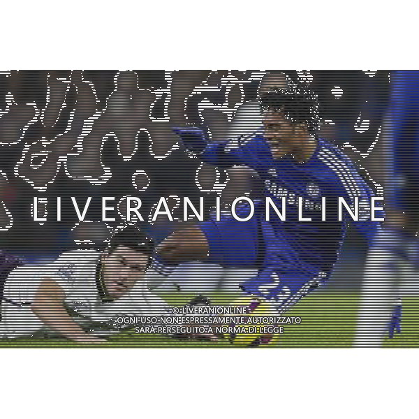 Chelsea\'s Juan Cuadrado is fouled by Everton\'s Gareth Barry, for which the latter receives a yellow card Photographer Craig Mercer/CameraSport Football - Barclays Premiership - Chelsea v Everton - Wednesday 11th February 2015 - Stamford Bridge - London © CameraSport - 43 Linden Ave. Countesthorpe. Leicester. England. LE8 5PG - Tel: +44 (0) 116 277 4147 - admin@camerasport.com - www.camerasport.com AG ALDO LIVERANI SAS ONLY ITALY