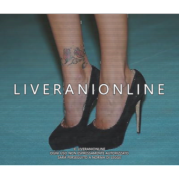 Anteprima - Red Carpet Film Cenerentola Milano - 18.02.2015 Nella Foto:Belen Rodriguez particolare scarpe e tatuaggio /Ph.Vitez-Ag. Aldo Liverani