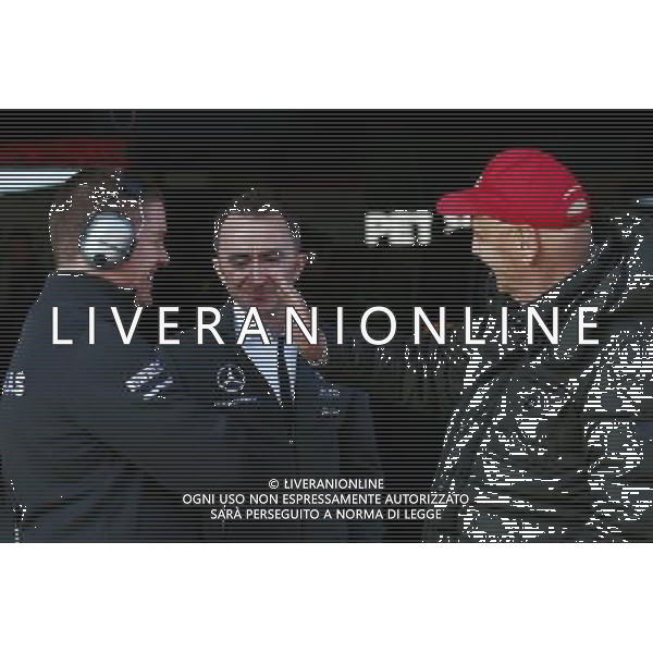 Paddy Lowe (GBR) Mercedes AMG F1 Executive Director (Technical) (Centre) and Niki Lauda (AUT) Mercedes Non-Executive Chairman (Right). 19.02.2015. Formula One Testing, Day One, Barcelona, Spain. AG ALDO LIVERANI SAS ONLY ITALY