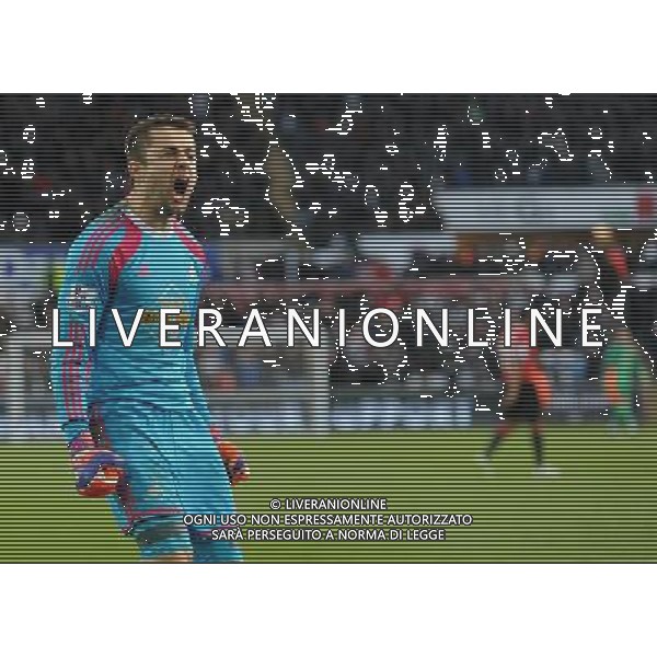 Swansea City\'s Lukasz Fabianski celebrates at full time infront of the Manchester United fans Photographer Ashley Crowden/CameraSport Football - Barclays Premiership - Swansea City v Manchester United - Saturday 21st February 2015 - Liberty Stadium - Swansea © CameraSport - 43 Linden Ave. Countesthorpe. Leicester. England. LE8 5PG - Tel: +44 (0) 116 277 4147 - admin@camerasport.com - www.camerasport.com AG ALDO LIVERANI SAS ONLY ITALY