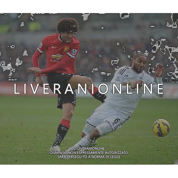 Manchester United\'s Marouane Fellaini has his shot at goal blocked by Swansea City\'s Ashley Williams Photographer Ashley Crowden/CameraSport Football - Barclays Premiership - Swansea City v Manchester United - Saturday 21st February 2015 - Liberty Stadium - Swansea © CameraSport - 43 Linden Ave. Countesthorpe. Leicester. England. LE8 5PG - Tel: +44 (0) 116 277 4147 - admin@camerasport.com - www.camerasport.com AG ALDO LIVERANI SAS ONLY ITALY