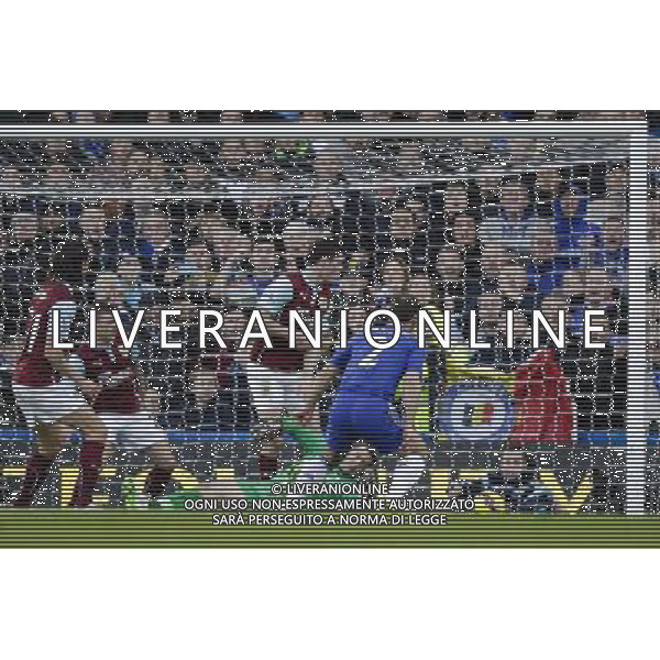 Chelsea\'s Branislav Ivanovic puts the ball past Burnley\'s Thomas Heaton scores his sides first goal Photographer Craig Mercer/CameraSport Football - Barclays Premiership - Chelsea v Burnley - Saturday 21st February 2015 - Stamford Bridge - London © CameraSport - 43 Linden Ave. Countesthorpe. Leicester. England. LE8 5PG - Tel: +44 (0) 116 277 4147 - admin@camerasport.com - www.camerasport.com AG ALDO LIVERANI SAS ONLY ITALY