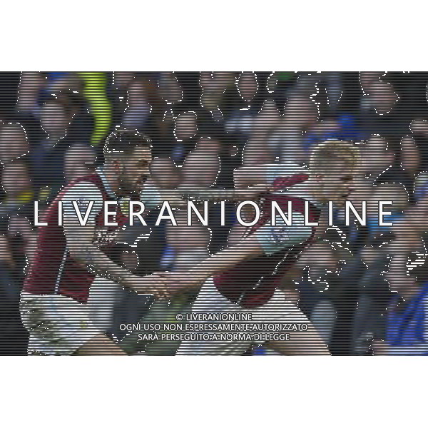 Burnley\'s Ben Mee (right) celebrates with Danny Ings after scoring his sides equalising goal to make the score 1-1 Photographer Craig Mercer/CameraSport Football - Barclays Premiership - Chelsea v Burnley - Saturday 21st February 2015 - Stamford Bridge - London © CameraSport - 43 Linden Ave. Countesthorpe. Leicester. England. LE8 5PG - Tel: +44 (0) 116 277 4147 - admin@camerasport.com - www.camerasport.com AG ALDO LIVERANI SAS ONLY ITALY