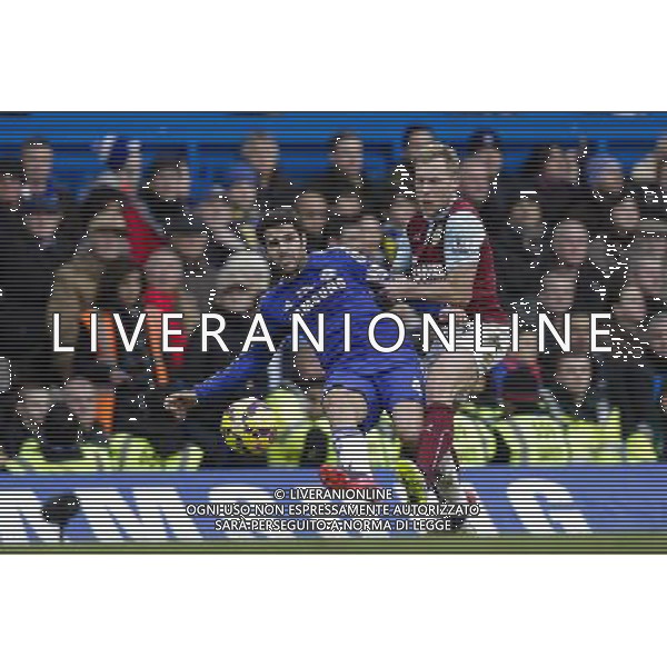 Chelsea\'s Cesc Fabregas under pressure from Burnley\'s Scott Arfield Photographer Craig Mercer/CameraSport Football - Barclays Premiership - Chelsea v Burnley - Saturday 21st February 2015 - Stamford Bridge - London © CameraSport - 43 Linden Ave. Countesthorpe. Leicester. England. LE8 5PG - Tel: +44 (0) 116 277 4147 - admin@camerasport.com - www.camerasport.com AG ALDO LIVERANI SAS ONLY ITALY