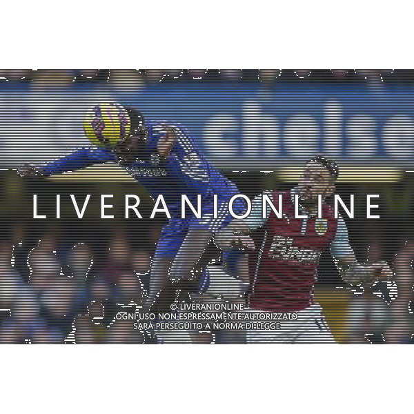 Chelsea\'s Kurt Zouma wins a header from Burnley\'s Danny Ings Photographer Craig Mercer/CameraSport Football - Barclays Premiership - Chelsea v Burnley - Saturday 21st February 2015 - Stamford Bridge - London © CameraSport - 43 Linden Ave. Countesthorpe. Leicester. England. LE8 5PG - Tel: +44 (0) 116 277 4147 - admin@camerasport.com - www.camerasport.com AG ALDO LIVERANI SAS ONLY ITALY
