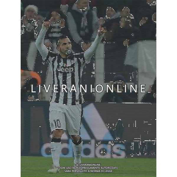 UEFA Champions League 2014/2015 Ottavi di Finale Andata Torino - 24.02.2015 Juventus-Borussia Dortmund Nella Foto: esultanza dopo il gol di carlos tevez con ciucciotto in bocca /Ph.Vitez-Ag. Aldo Liverani