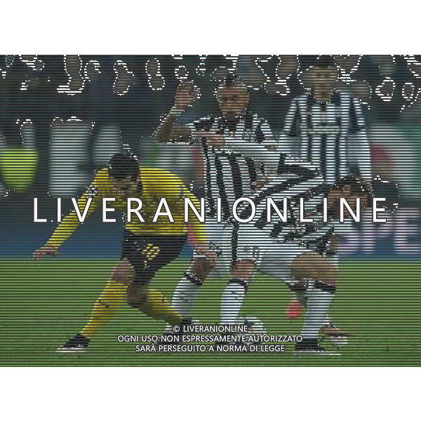 UEFA Champions League 2014/2015 Ottavi di Finale Andata Torino - 24.02.2015 Juventus-Borussia Dortmund Nella Foto:mkhitaryan claudio marchisio e arturo vidal /Ph.Vitez-Ag. Aldo Liverani