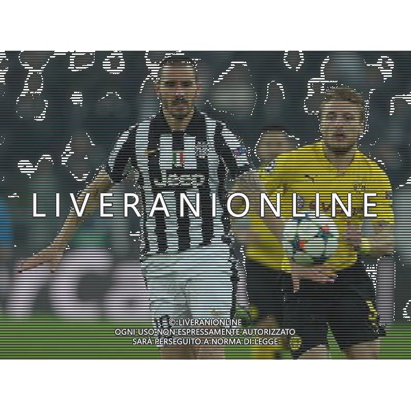 UEFA Champions League 2014/2015 Ottavi di Finale Andata Torino - 24.02.2015 Juventus-Borussia Dortmund Nella Foto: leonardo bonucci e ciro immobile /Ph.Vitez-Ag. Aldo Liverani