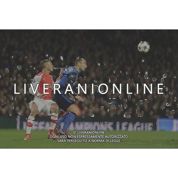 Monaco\'s Dimitar Berbatov holds off the challenge from Arsenal\'s Kieran Gibbs Photographer Ashley Western/CameraSport Football - UEFA Champions League Second Round 1st Leg - Arsenal v Monaco - Wednesday 25th February 2015 - Emirates Stadium - London © CameraSport - 43 Linden Ave. Countesthorpe. Leicester. England. LE8 5PG - Tel: +44 (0) 116 277 4147 - admin@camerasport.com - www.camerasport.com AG ALDO LIVERANI SAS ONLY ITALY