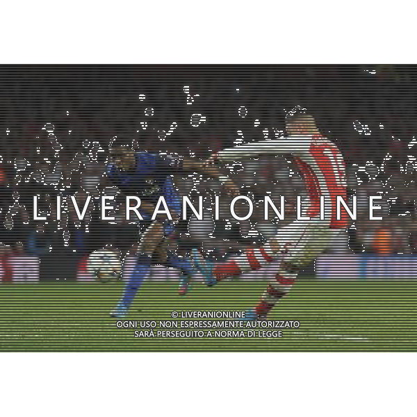 Arsenal\'s Alex Oxlade-Chamberlain scores the Arsenal goal in the 3-1 defeat Photographer Ashley Western/CameraSport Football - UEFA Champions League Second Round 1st Leg - Arsenal v Monaco - Wednesday 25th February 2015 - Emirates Stadium - London © CameraSport - 43 Linden Ave. Countesthorpe. Leicester. England. LE8 5PG - Tel: +44 (0) 116 277 4147 - admin@camerasport.com - www.camerasport.com AG ALDO LIVERANI SAS ONLY ITALY