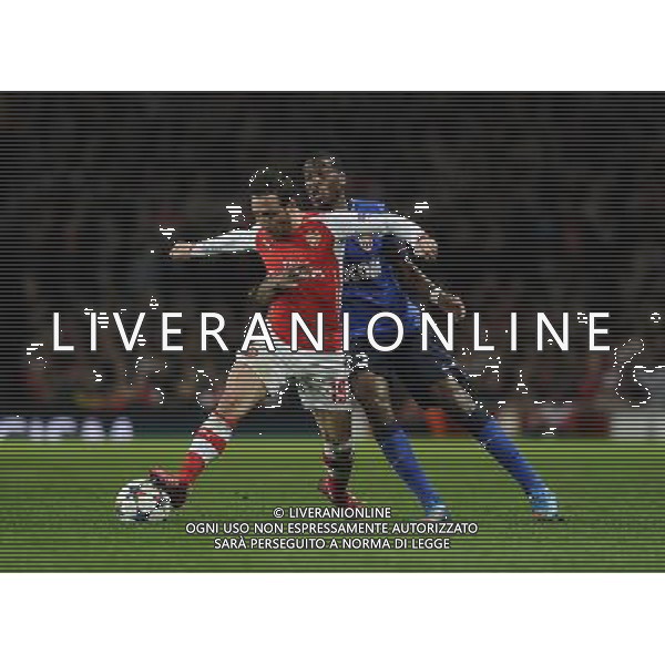 Arsenal\'s Santi Cazorla is tackled by Monaco\'s Geoffrey Kondogbial Photographer Ashley Western/CameraSport Football - UEFA Champions League Second Round 1st Leg - Arsenal v Monaco - Wednesday 25th February 2015 - Emirates Stadium - London © CameraSport - 43 Linden Ave. Countesthorpe. Leicester. England. LE8 5PG - Tel: +44 (0) 116 277 4147 - admin@camerasport.com - www.camerasport.com AG ALDO LIVERANI SAS ONLY ITALY