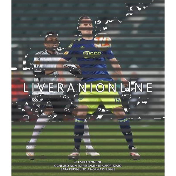 2015.02.26 WARSZAWA PILKA NOZNA UEFA EUROPA LEAGUE 2014/2015 UEFA LIGA EUROPY 1/16 FINALU 2014/2015 MECZ LEGIA WARSZAWA - AJAX AMSTERDAM N/Z DOSSA JUNIOR ARKADIUSZ AREK MILIK FOTO NORBERT BARCZYK / PRESS FOCUS / NEWSPIX.PL --- Newspix.pl /Agenzia Aldo Liverani sas - ITALY ONLY - LEGIA VARSAVIA vs AJAX AMSTERDAM EUROPA LEAGUE *** Local Caption *** www.newspix.pl mail us: info@newspix.pl call us: 0048 022 23 22 222 --- Polish Picture Agency by Ringier Axel Springer Poland