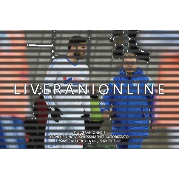 Marcelo BIELSA / Andre Pierre GIGNAC - 27.02.2015 - Marseille / Caen - 27eme journee de Ligue 1 Photo : Gaston Petrelli / Icon Sport AG ALDO LIVERANI SAS ONLY ITALY