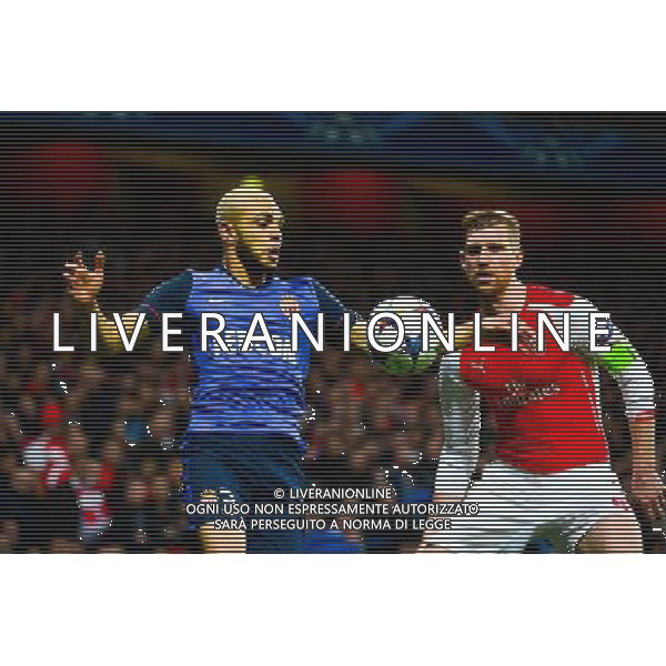Layvin KURZAWA / Per MERTESACKER - 25.02.2015 - Arsenal / Monaco - 1/8Finale Champions League Photo : Winter Press / Icon Sport AG ALDO LIVERANI SAS ONLY ITALY *** Local Caption ***