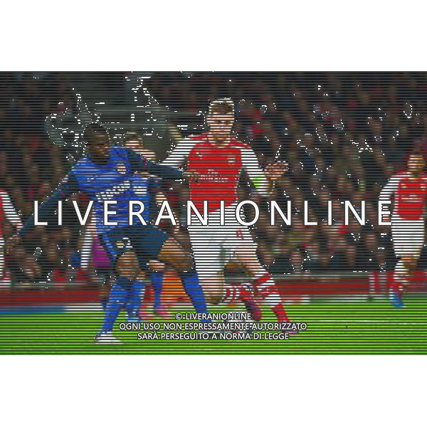 Uwa Echiejile ELDERSON / Per MERTESACKER - 25.02.2015 - Arsenal / Monaco - 1/8Finale Champions League Photo : Winter Press / Icon Sport AG ALDO LIVERANI SAS ONLY ITALY *** Local Caption ***