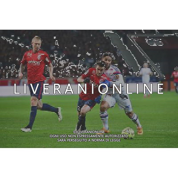 Sebastien CORCHIA / Nabil FEKIR - 28.02.2015 - Lille / Lyon - 27eme journee de Ligue 1 Photo : Dave Winter / Icon Sport AG ALDO LIVERANI SAS ONLY ITALY