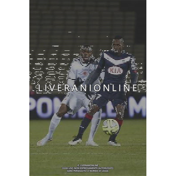 Andre POKO / Prince ONIANGUE - 28.02.2015 - Bordeaux / Reims - 27eme journee de Ligue 1 Photo : Caroline Blumberg / Icon Sport /Agenzia Aldo Liverani sas - ITALY ONLY - EDITORIAL USE ONLY