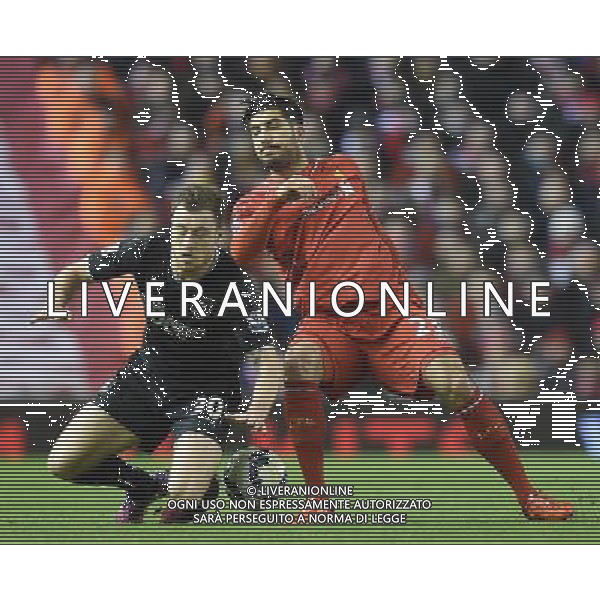 Burnley\'s Ashley Barnes battles with Liverpool\'s Emre Can Photographer Dave Howarth/CameraSport Football - Barclays Premiership - Liverpool v Burnley - Wednesday 4th March 2015 - Anfield - Liverpool © CameraSport - 43 Linden Ave. Countesthorpe. Leicester. England. LE8 5PG - Tel: +44 (0) 116 277 4147 - admin@camerasport.com - www.camerasport.com /Agenzia Aldo Liverani sas - ITALY ONLY - EDITORIAL USE ONLY