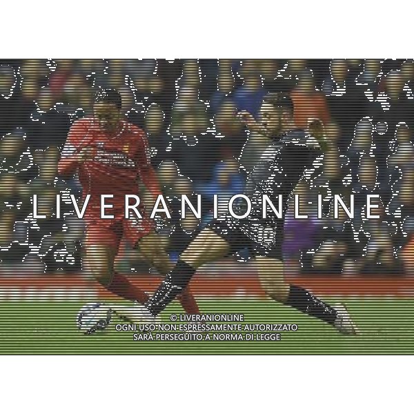 Liverpool\'s Raheem Sterling is tackled by Burnley\'s Danny Ings Photographer Dave Howarth/CameraSport Football - Barclays Premiership - Liverpool v Burnley - Wednesday 4th March 2015 - Anfield - Liverpool © CameraSport - 43 Linden Ave. Countesthorpe. Leicester. England. LE8 5PG - Tel: +44 (0) 116 277 4147 - admin@camerasport.com - www.camerasport.com /Agenzia Aldo Liverani sas - ITALY ONLY - EDITORIAL USE ONLY