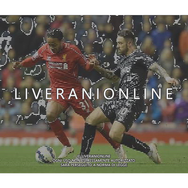 Liverpool\'s Raheem Sterling is tackled by Burnley\'s Danny Ings Photographer Dave Howarth/CameraSport Football - Barclays Premiership - Liverpool v Burnley - Wednesday 4th March 2015 - Anfield - Liverpool © CameraSport - 43 Linden Ave. Countesthorpe. Leicester. England. LE8 5PG - Tel: +44 (0) 116 277 4147 - admin@camerasport.com - www.camerasport.com /Agenzia Aldo Liverani sas - ITALY ONLY - EDITORIAL USE ONLY