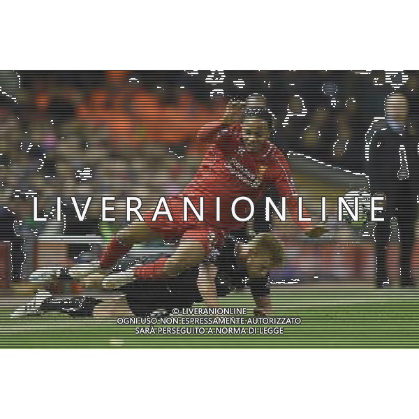 Liverpool\'s Raheem Sterling is tackled by Burnley\'s Ben Mee Photographer Dave Howarth/CameraSport Football - Barclays Premiership - Liverpool v Burnley - Wednesday 4th March 2015 - Anfield - Liverpool © CameraSport - 43 Linden Ave. Countesthorpe. Leicester. England. LE8 5PG - Tel: +44 (0) 116 277 4147 - admin@camerasport.com - www.camerasport.com /Agenzia Aldo Liverani sas - ITALY ONLY - EDITORIAL USE ONLY